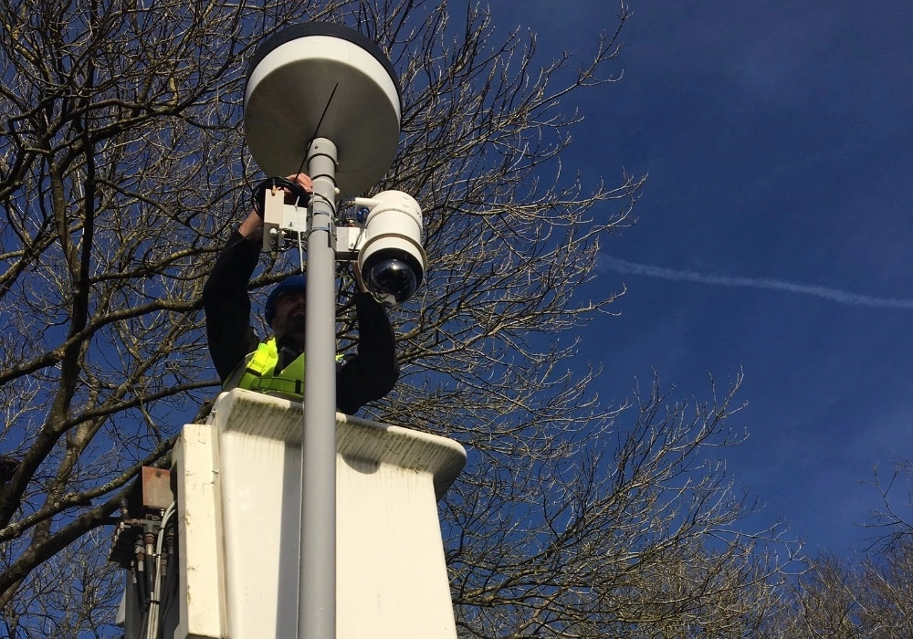 Council Worker Installing a WCCTV Redeployable Dome Camera