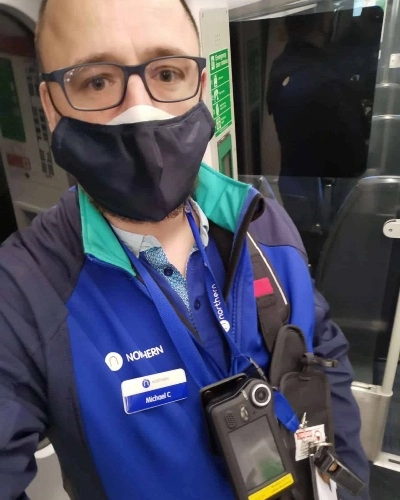 Northern Rail Worker Wearing Body Camera - Tall Thumb