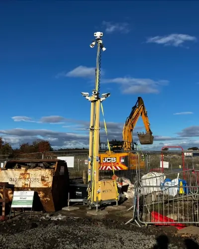 CS tower guarding heavy machinery tall