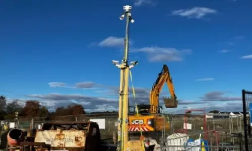 CS tower guarding heavy machinery wide